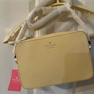 NWT Harper Crossbody bag in the color Butter.